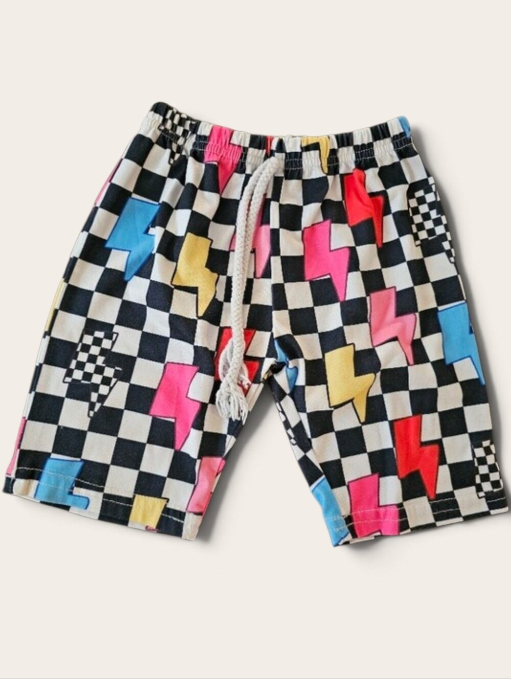 Kids Black Checkered Pajama Shorts with Pink, Blue & Yellow Lightning Bolts